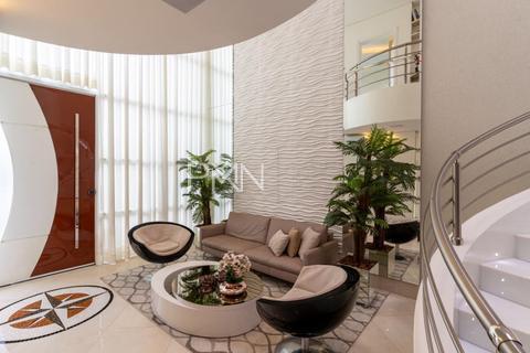 Casa à venda em Paulínia, residencial Campos do Conde II, com 3 suítes, com 290 m²